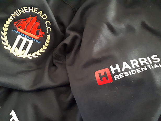 Minehead Cricket Club team strip with Harris Residential logo